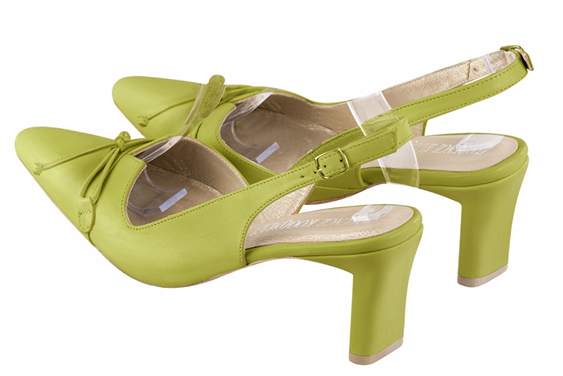 Pistachio green women's open back shoes, with a knot. Tapered toe. Medium comma heels. Rear view - Florence KOOIJMAN